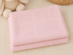 Pink cellular cotton baby blanket folded