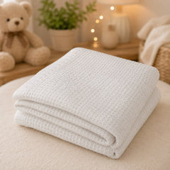 Beige waffle cotton baby thermal blanket folded