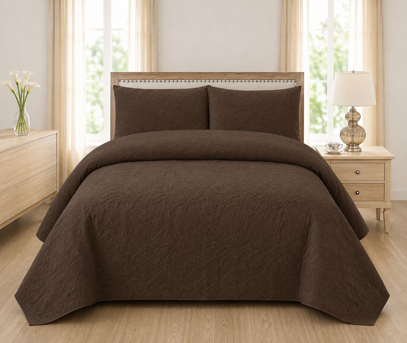 Chocolate brown quilted bedspread styled on a bed in a cosy neutral bedroom