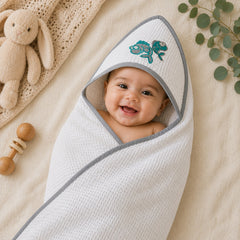 Baby wrapped in the fish embroidered hooded baby towel