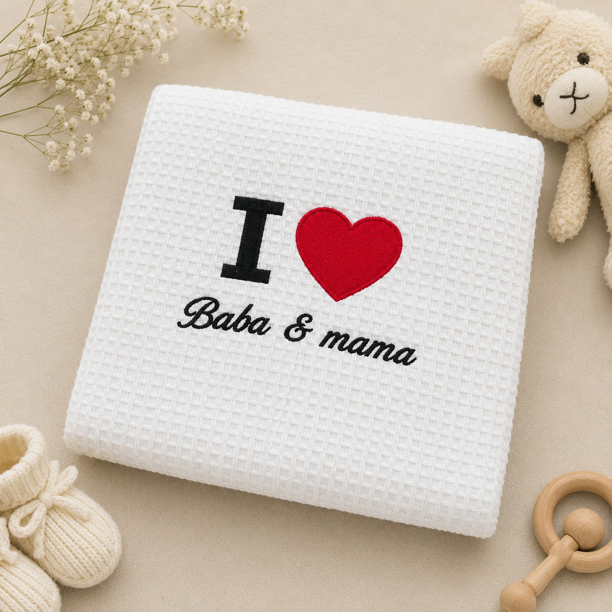 I Love Baba and Mama embroidered white waffle baby blanket, folded