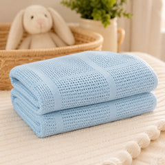 Blue 100% cotton cellular baby blanket folded
