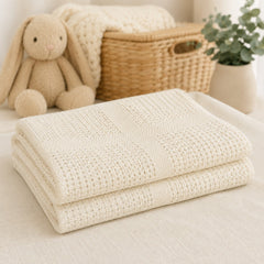Ivory cellular cotton baby blanket folded