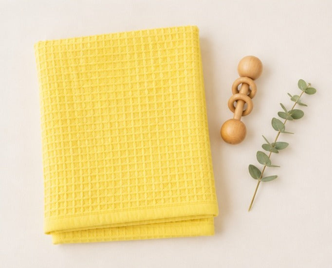 Yellow honeycomb waffle cotton baby blanket folded flat