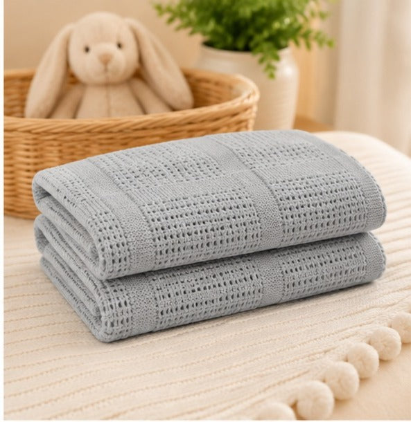 Grey 100% cotton cellular baby blanket folded