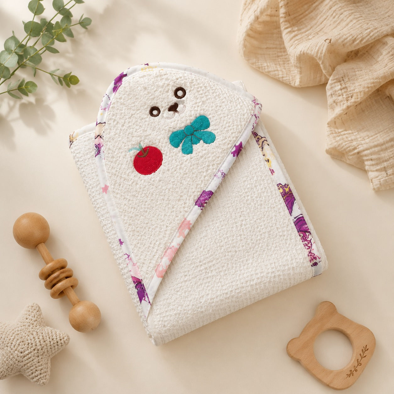 Teddy and apple embroidered hooded baby towel folded